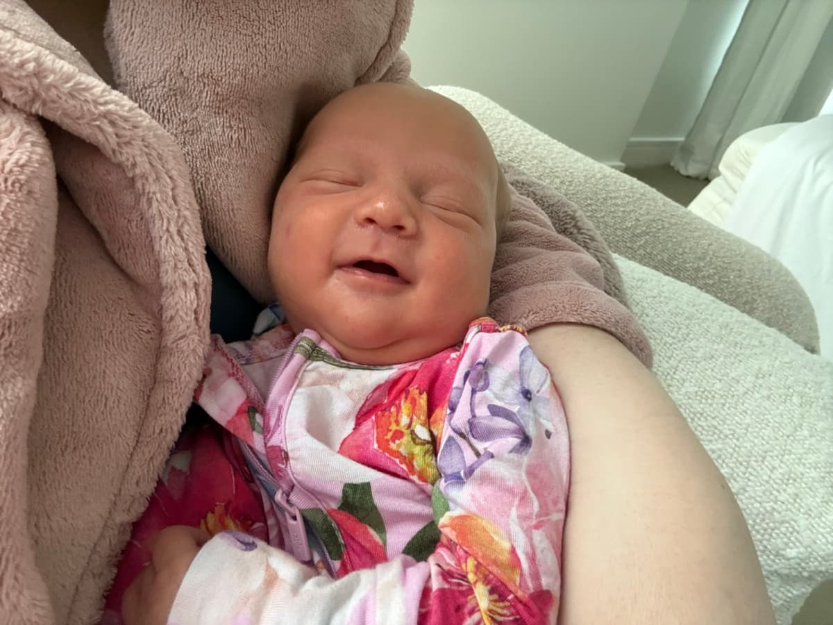 Chloe smiling at home